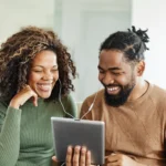 Romance Alive couple making a playlist togther